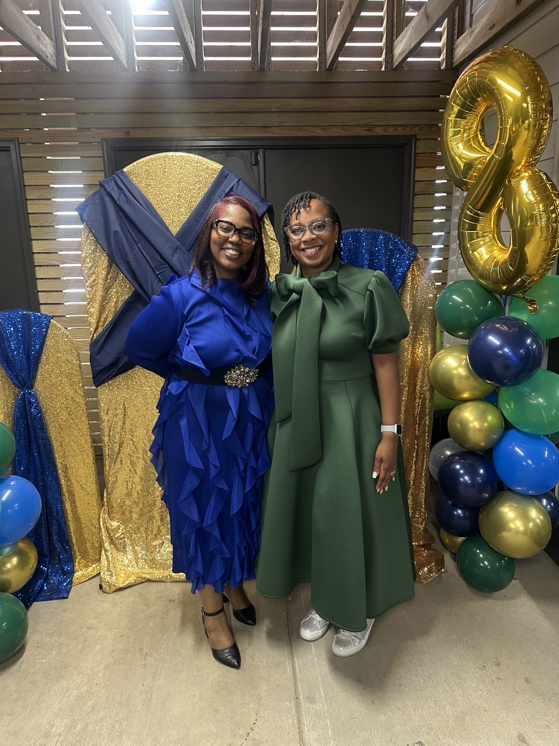 Apostle Katabia Henry and a guest celebrating together